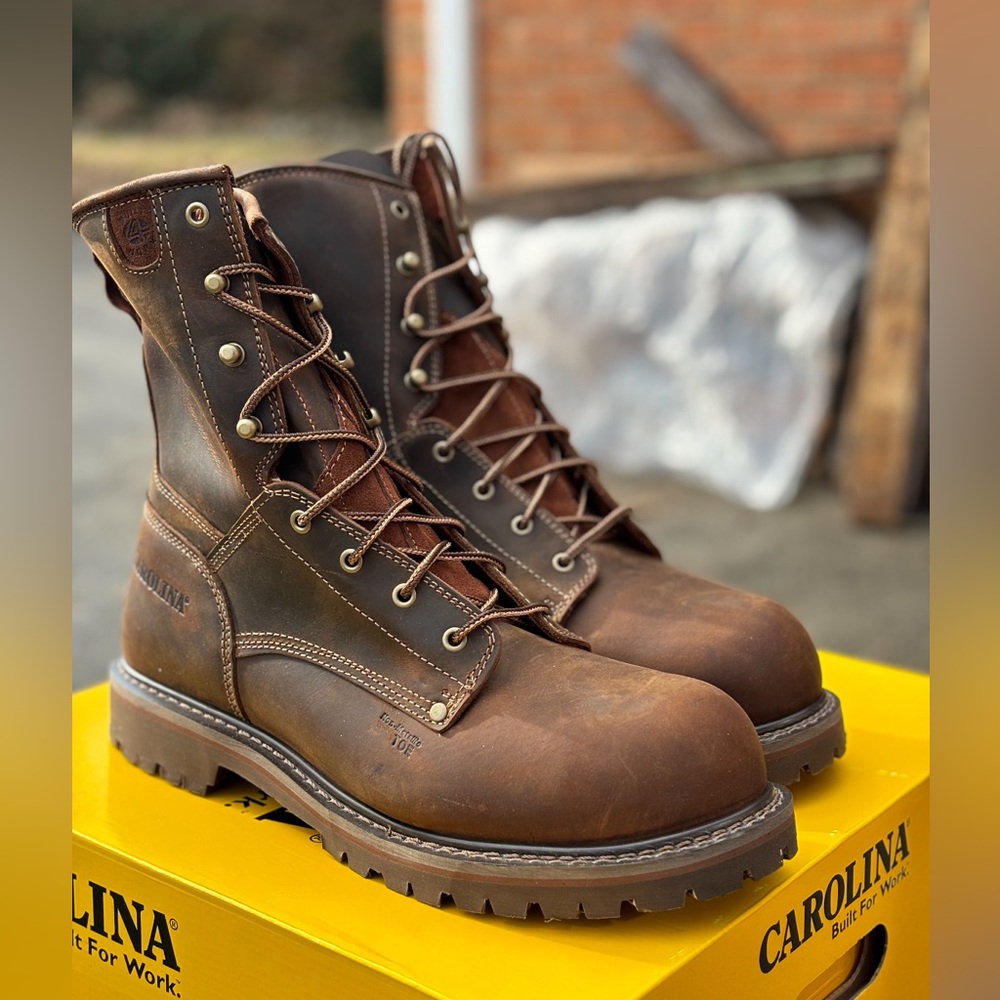 Men’s size 14 EE CAROLINA steel toe (NEVER WORN)!